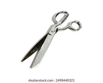 A single tailor cloth fabric scissors made from metal for sewing isolated on white background - Powered by Shutterstock