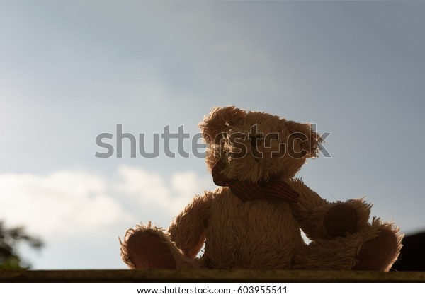 single teddy bear blue sky background stock photo edit now 603955541 single teddy bear blue sky background stock photo edit now 603955541