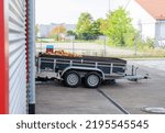 Single trailer filled with old bread parked near the warehouse - food resources waste concept