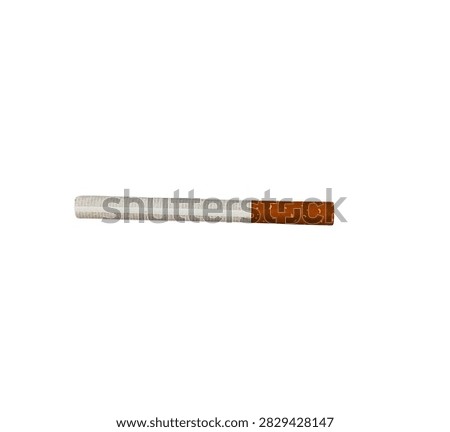 Single unlit cigarette with brown filter isolated on white background cutout