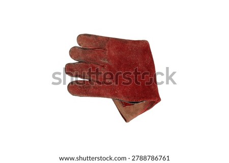 A single, well-worn, red leather work glove with visible dirt and scuffs, isolated on a white background
