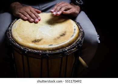 Single West African Drum In Dramatic Single Light.