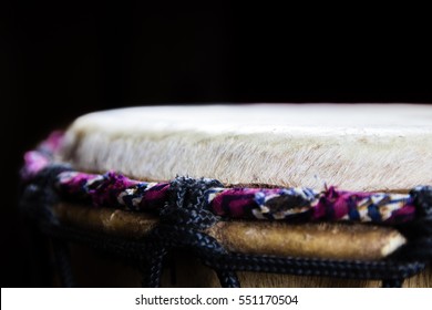 Single West African Drum In Dramatic Single Light.