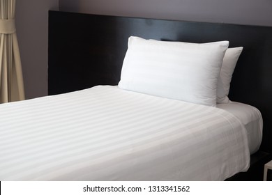 Single White Bed In The Room At The Hotel