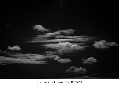 Single White Cloud Isolated On Black Background And Texture. Brush Cloud Black Background. Dark Cloud.