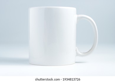 Single White Plain Mug Isolated In White Background