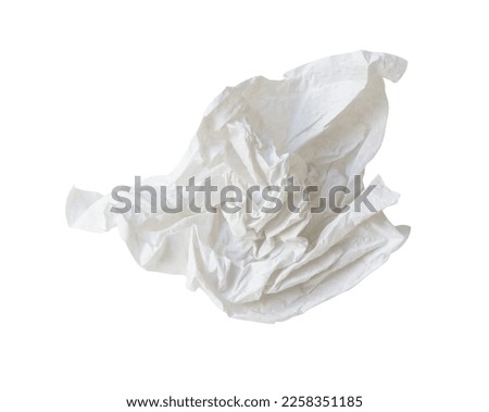 Single white screwed or crumpled tissue paper or napkin in strange shape after use in toilet or restroom is isolated on white background with clipping path.