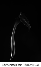 A Single White Smoke Burn From Incense, Shot In Studio With Dark Black Background, For Design And Religion Concept