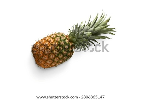 A single whole pineapple on a plain white background