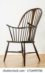 Single Windsor Style Chair In Empty Room