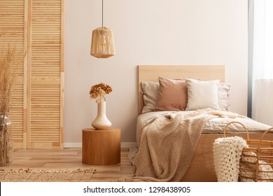 Single Wooden Bed With Natural Decoration In Beige Colour In Kid Room