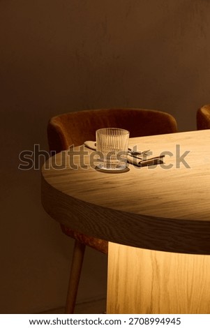 Single wooden table with soft shadows, Ideal environment for relaxing drink and latenight discussions