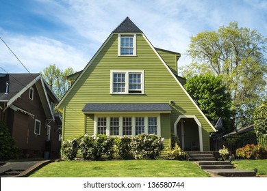 Single-family American craftsman house with blue sky background