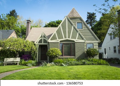 Single-family American craftsman house with blue sky background