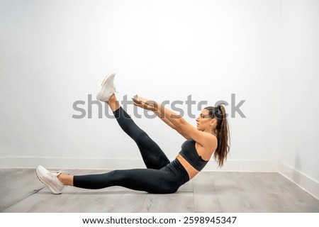 Single-leg V-up exercise enhancing core strength, balance, flexibility, and improving athletic performance significantly