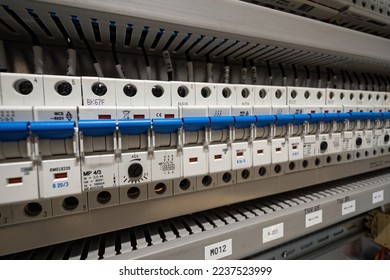 Single-phase circuit breakers next to each other in the switchboard. - Shutterstock ID 2237523999