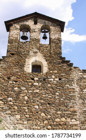 singular and ancient bell tower with two bells in the picturesque town of Berrós Jussa in the Pyrenees of Catalonia