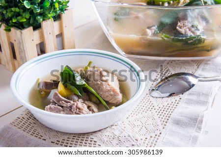 sinigang or tamarind soup with pork and vegetables