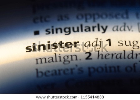 sinister word in a dictionary. sinister concept.