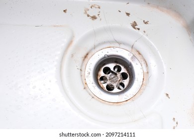 A Sink Drain Hole With Limescale Or Lime Scale And Rust On It, Dirty Rusty Bathroom Washbowl