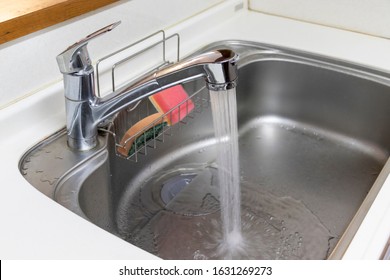 Sink made of stainless steel in the kitchen - Shutterstock ID 1631269273