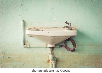 sink old on wall Aquamarine
