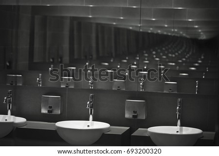 Sink row from mirror reflection.