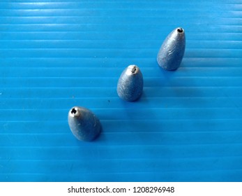 Sinker On Blue Polypropylene Board.pp Board