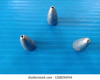 Sinker On Blue Polypropylene Board.pp Board