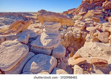 A Sinkhole Along A Ridge In The Devil's Playground At Petrified Forest National Park Called Lucifer's Pit.