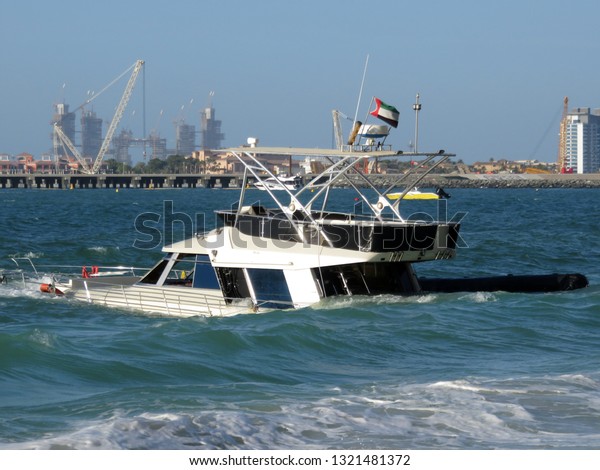 Sinking Boat By Beach Harbour Cranes Stock Photo Edit Now