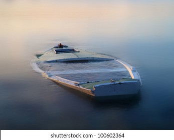 Sinking Boat In The Fog