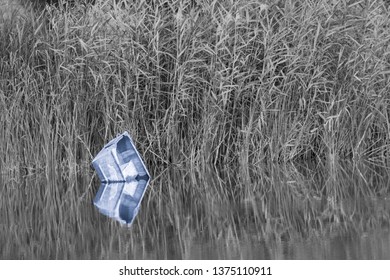 Sinking Boat On A Lake - Highlighted In Blank & White