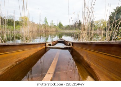 Sinking Canoe In A Lake