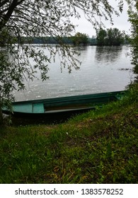 Sinking Row Boat On The River