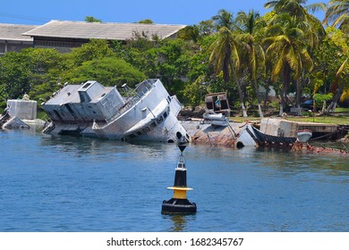 Sinking Sailboat Abandonned On The Shore Of A Nigeria City