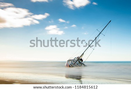 Sinking Ship at a Beach 