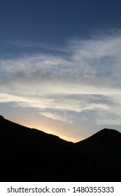 A Sinking Star Over The Cottonwood Mountains In The Colorado Desert Region Of Joshua Tree National Park Imparts A Magical Atmosphere, And Admiration For Native Plants Growing In Their Substrate.