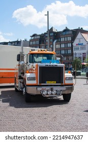 Sint Niklaas, Belgium, 05 May 2019, Front Of A White Orange Mack Truck Ecodondyne