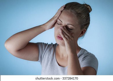 Sinus Pain, Sinus Pressure, Sinusitis. Sad Woman Holding Her Nose And Head Because Sinus Pain