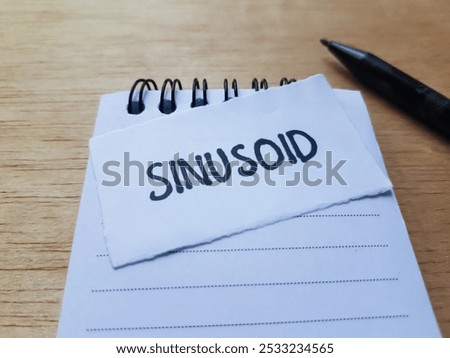 Sinusoid writting on table background.