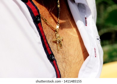 Sioagard, Hungary - August 14, 2018: Hungarian Man`s Chest With Hairs, And Massive Gold Chain With Cross