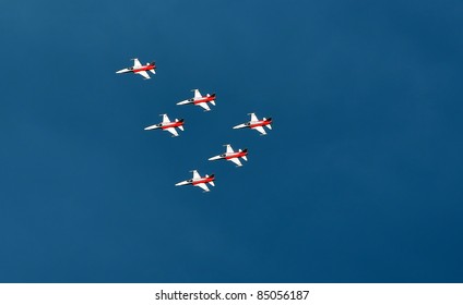 SION, SWITZERLAND - SEPTEMBER 18: Patrouille suisse in formation at the Breitling Air show.  September 18, 2011 in Sion, Switzerland