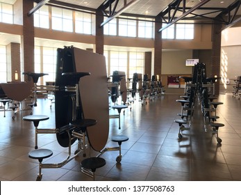 Sioux Falls, South Dakota, USA - 4/2019: High School Lunch Room With Tables Folded