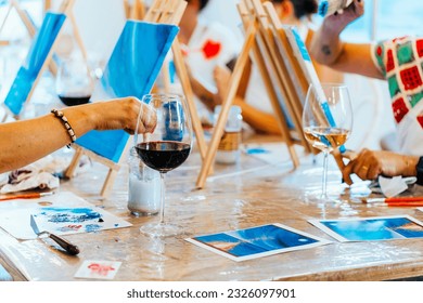 Sip and Paint Event: Women Creating Art over Wine Glasses