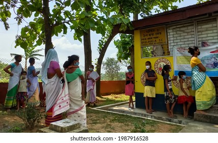 Sipajhar,Assam,India,June8,2021: Beautiful Environment Of The Campus Of A Rural Health Care Center In Assam Where Ladies And Girls Are Seen Standing In Queue Wearing Traditional Attire And Face Mask