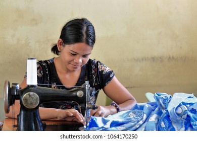 Sipalay, Philippines-October 13, 2016: Filipino seamstresses and tailors still have in use some old vintage models of sewing machines. Here in the City Public Market. Negros Occidental-Philippines.