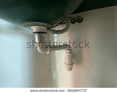 the siphon under a sink