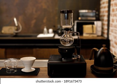 
Siphon Vacuum Coffee Maker On Cafe Bar.