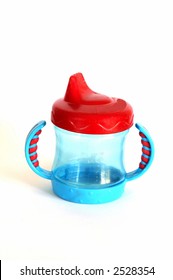 A Sippy Cup Isolated Against A White Background